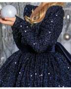 Navy sequin girls dress with long sleeves, open V-back and satin bow, designed for Christmas and holiday parties, view 7