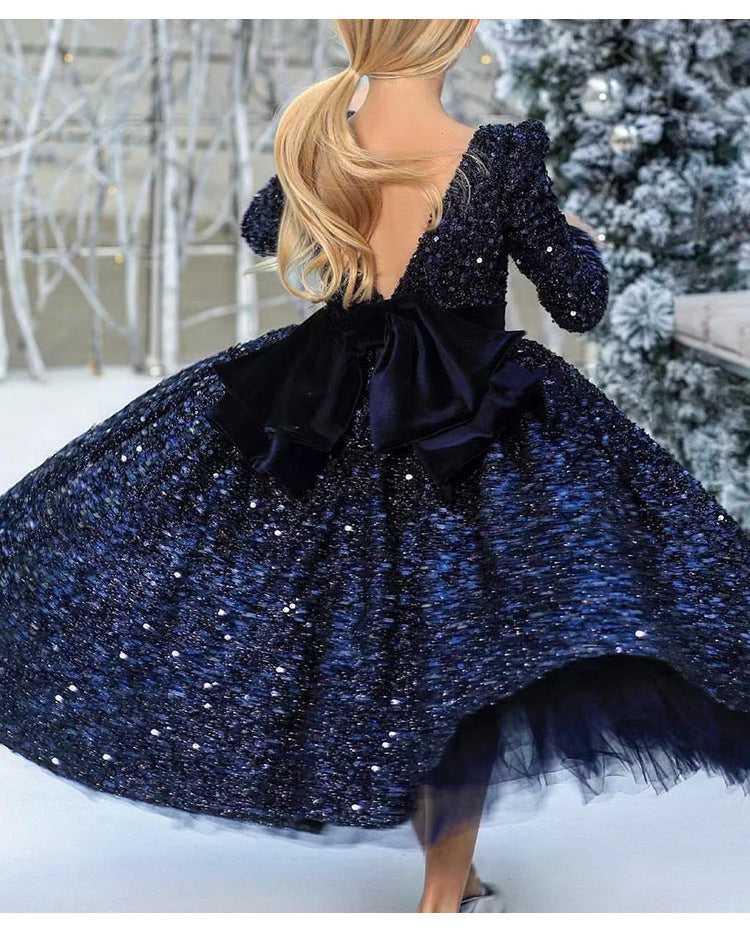 Navy sequin girls dress with long sleeves, open V-back and satin bow, designed for Christmas and holiday parties, view 9