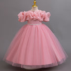 Dusty Rose glitter tulle girls ball gown with an off-shoulder ruffle neckline, pearl beaded waist and back bow, designed for birthdays, weddings and flower girls.
