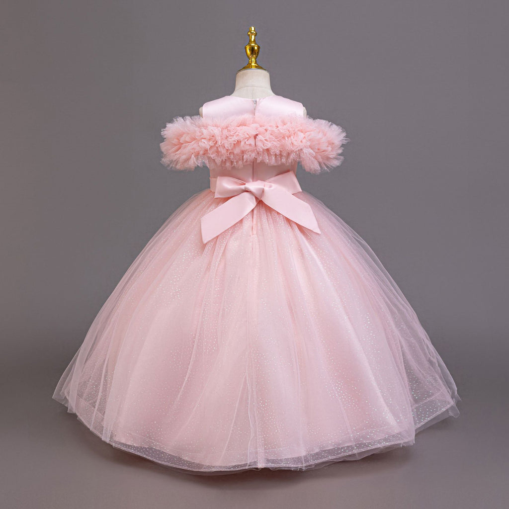 Pink tulle girls ball gown with ruffled off-shoulder neckline and back bow, designed for parties.