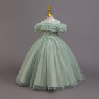 Sage green tulle girls ball gown with off-shoulder ruffles and lace waist, designed for weddings and parties.