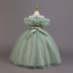 Sage green tulle girls ball gown back view with satin bow, designed for flower girls and parties.