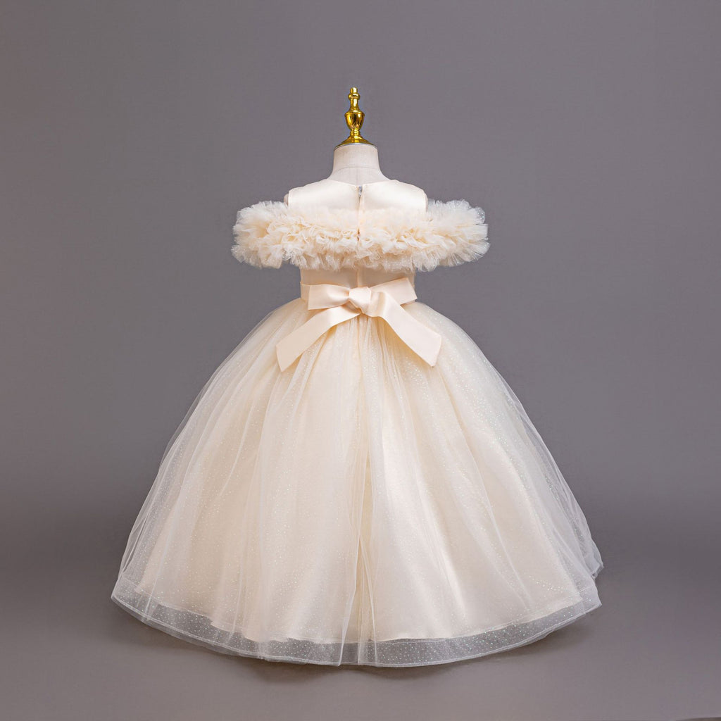 Champagne tulle girls ball gown back view with satin bow, designed for flower girls.