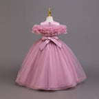 Mauve tulle girls ball gown back view with V back and satin bow, designed for parties and recitals.