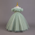 Sage green tulle girls ball gown with off-shoulder ruffle neckline, lace waist and back bow, designed for weddings and parties.