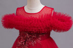 Red tulle girls ball gown with ruffled off-shoulder neckline, floral appliqué and satin bow back, designed for weddings and parties, view 4