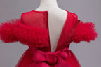 Red tulle girls ball gown with ruffled off-shoulder neckline, floral appliqué and satin bow back, designed for weddings and parties, view 5