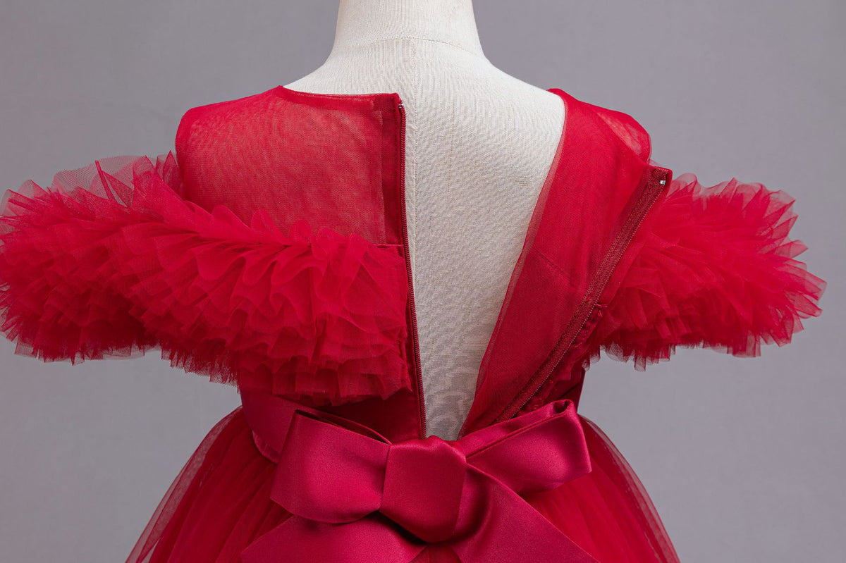 Red tulle girls ball gown with ruffled off-shoulder neckline, floral appliqué and satin bow back, designed for weddings and parties, view 5