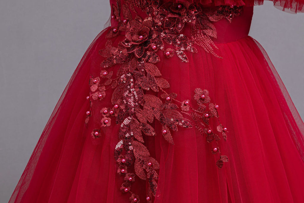 Red tulle girls ball gown with ruffled off-shoulder neckline, floral appliqué and satin bow back, designed for weddings and parties, view 6