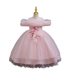 Pink tulle girls ball gown with ruffled off-shoulder neckline, floral appliqué and satin bow back, designed for weddings and parties, view 2