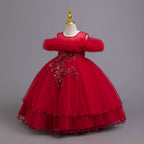 Red tulle girls ball gown with ruffled off-shoulder neckline, floral appliqué and satin bow back, designed for weddings and parties, view 2