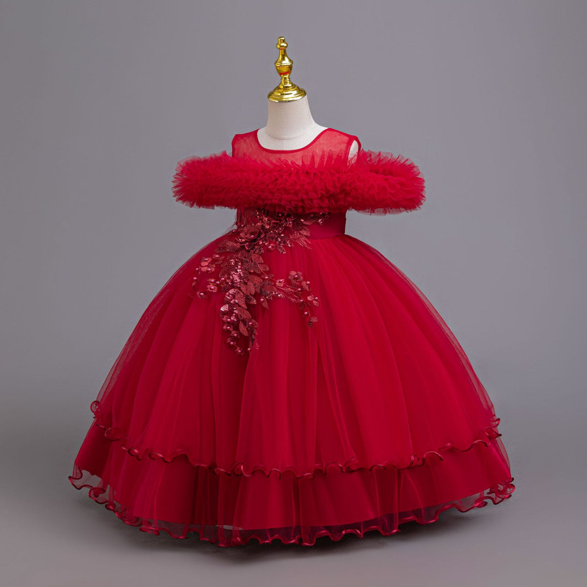 Red tulle girls ball gown with ruffled off-shoulder neckline, floral appliqué and satin bow back, designed for weddings and parties, view 2