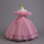 Mauve tulle girls ball gown with ruffled off-shoulder neckline, floral appliqué and satin bow back, designed for weddings and parties, view 2