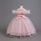 Pink tulle girls ball gown with ruffled off-shoulder neckline, floral appliqué and satin bow back, designed for weddings and parties, view 4