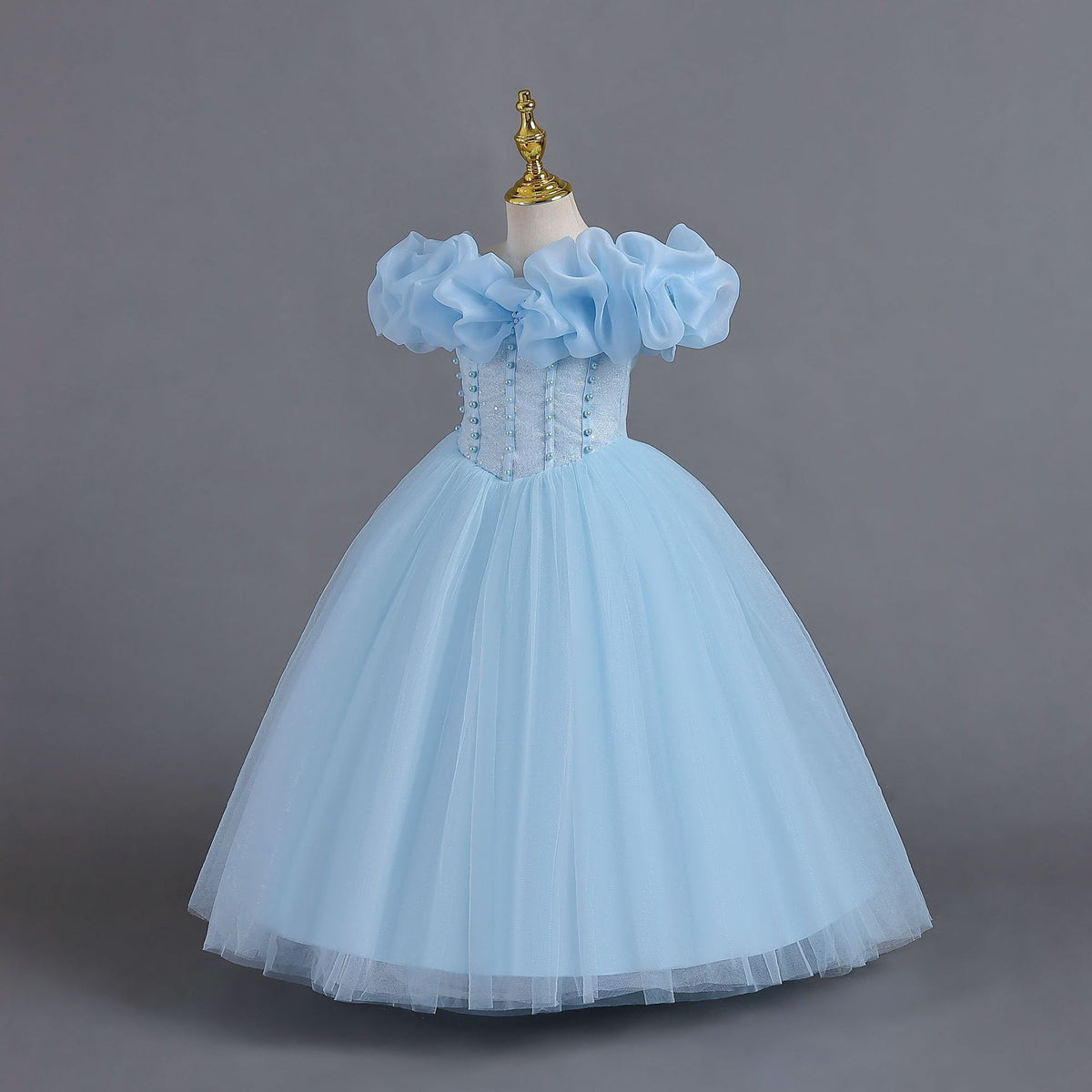 Sky Blue tulle girls princess ball gown with off-shoulder organza ruffle sleeves and pearl-beaded bodice, side view, designed for Christmas, weddings and flower girls.