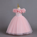 Pink tulle girls princess ball gown with off-shoulder organza ruffle sleeves and pearl-beaded bodice, designed for Christmas, weddings and flower girls.