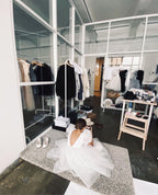White organza girls dress with puff sleeves and full skirt, designed for recitals and photoshoots.
