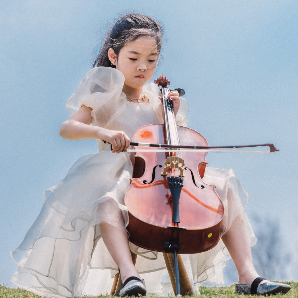 White organza girls dress with a full twirling skirt, designed for flower girls and parties.