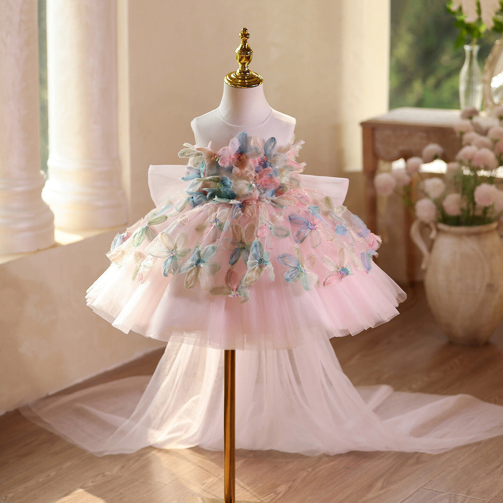 Pink tulle princess dress for girls with 3D floral applique and a tiered skirt, front view, for a birthday party.