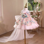 Side view of the pink tulle princess dresses for girls, showing the tiered skirt and the train trailing behind.