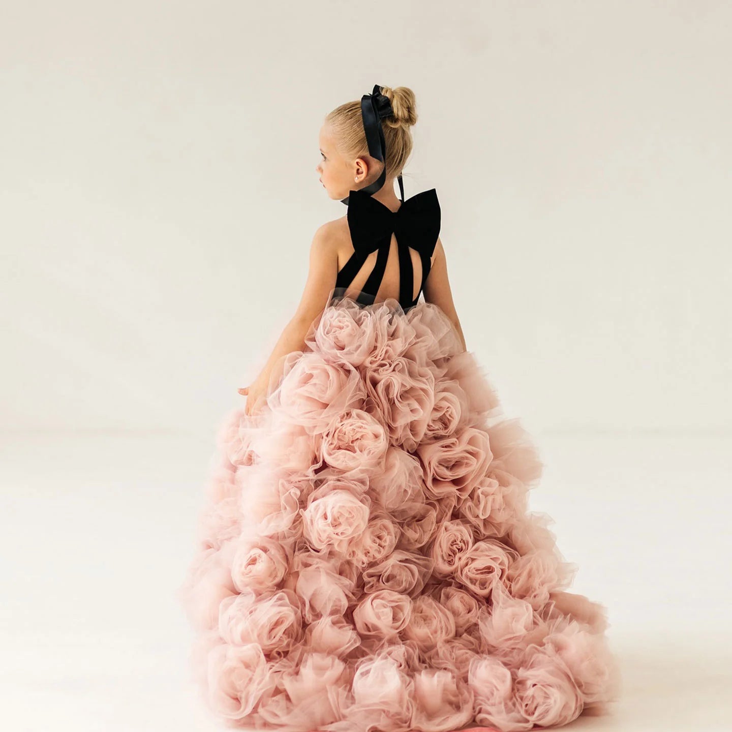 Floral trailing flower girl wedding dress in pink