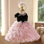Pink and black sequin girls party dress with pearl neckline, satin bow and petal skirt, designed for birthdays and pageants.