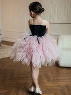 Pink and black tulle girls tutu dress with a lace-up back and ribbon ties, designed for birthday parties.