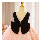 Pink and black velvet and tulle girls party dress with a pearl-trimmed neckline, 3D rosette skirt and big back bow, designed for birthdays and weddings, view 11