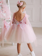 Pink tulle girls dress with 3D floral appliqué, butterfly-wing back and tulle shoulder bows, designed for birthdays and weddings, view 5
