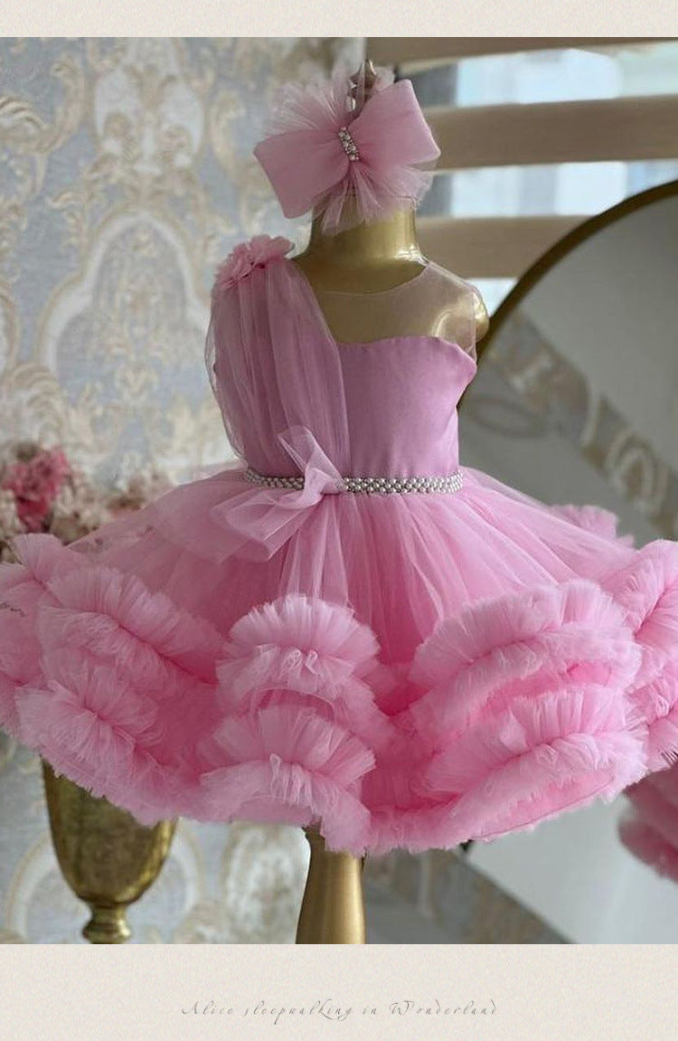 Pink tulle girls one-shoulder dress with pearl beaded waist and tiered ruffle skirt, designed for birthdays, pageants and princess parties, view 9