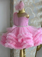 Pink tulle girls one-shoulder dress with pearl beaded waist and tiered ruffle skirt, designed for birthdays, pageants and princess parties, view 2