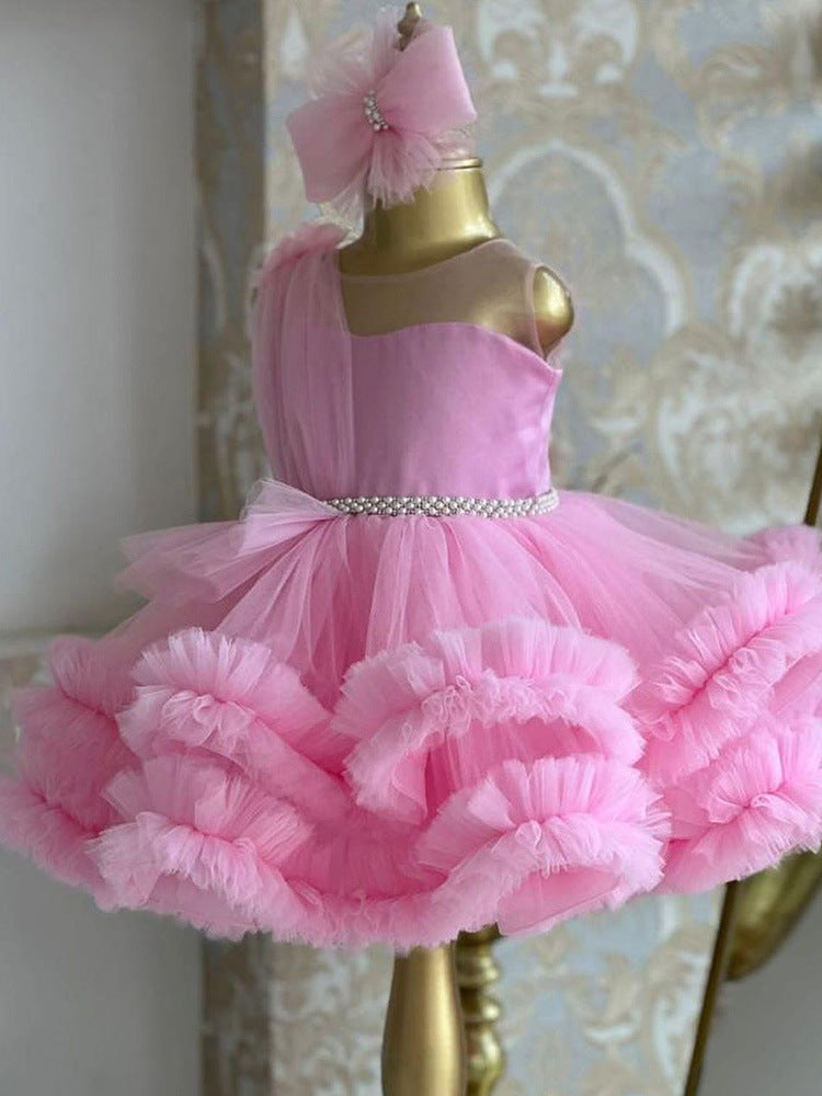 Pink tulle girls one-shoulder dress with pearl beaded waist and tiered ruffle skirt, designed for birthdays, pageants and princess parties, view 2