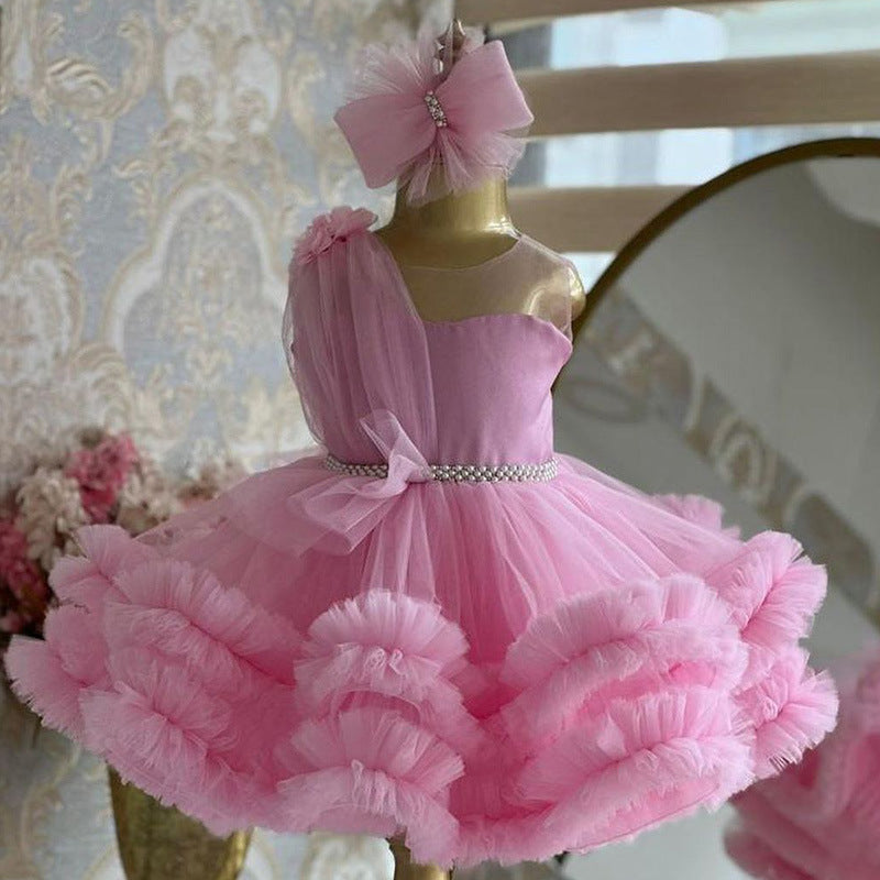 Pink tulle girls one-shoulder dress with pearl beaded waist and tiered ruffle skirt, designed for birthdays, pageants and princess parties, view 3