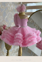Pink tulle girls one-shoulder dress with pearl beaded waist and tiered ruffle skirt, designed for birthdays, pageants and princess parties, view 7