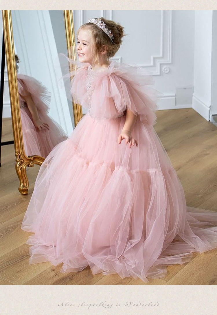Pink tulle girls princess gown with sequin bodice, ruffled flutter sleeves and tiered train skirt, designed for birthdays and weddings, view 10