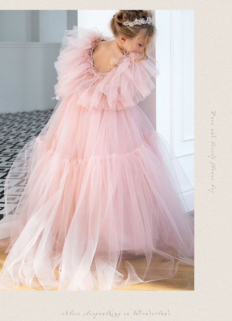 Pink tulle girls princess gown with sequin bodice, ruffled flutter sleeves and tiered train skirt, designed for birthdays and weddings, view 11