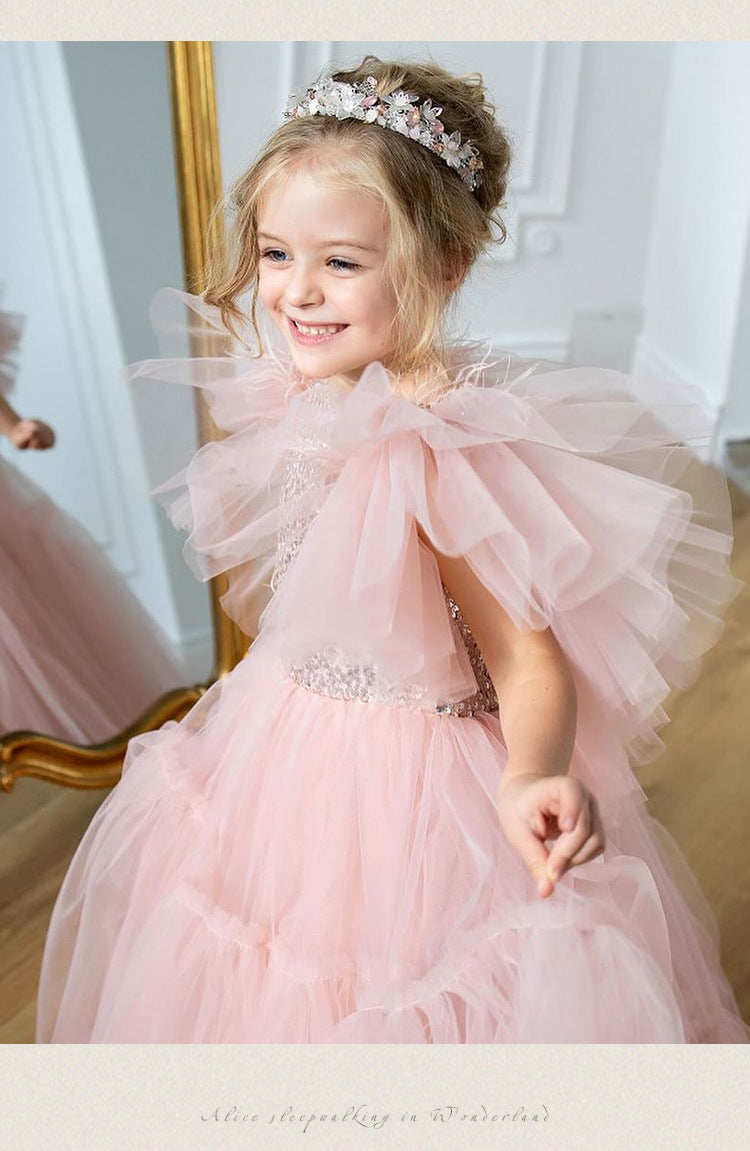 Pink tulle girls princess gown with sequin bodice, ruffled flutter sleeves and tiered train skirt, designed for birthdays and weddings, view 12