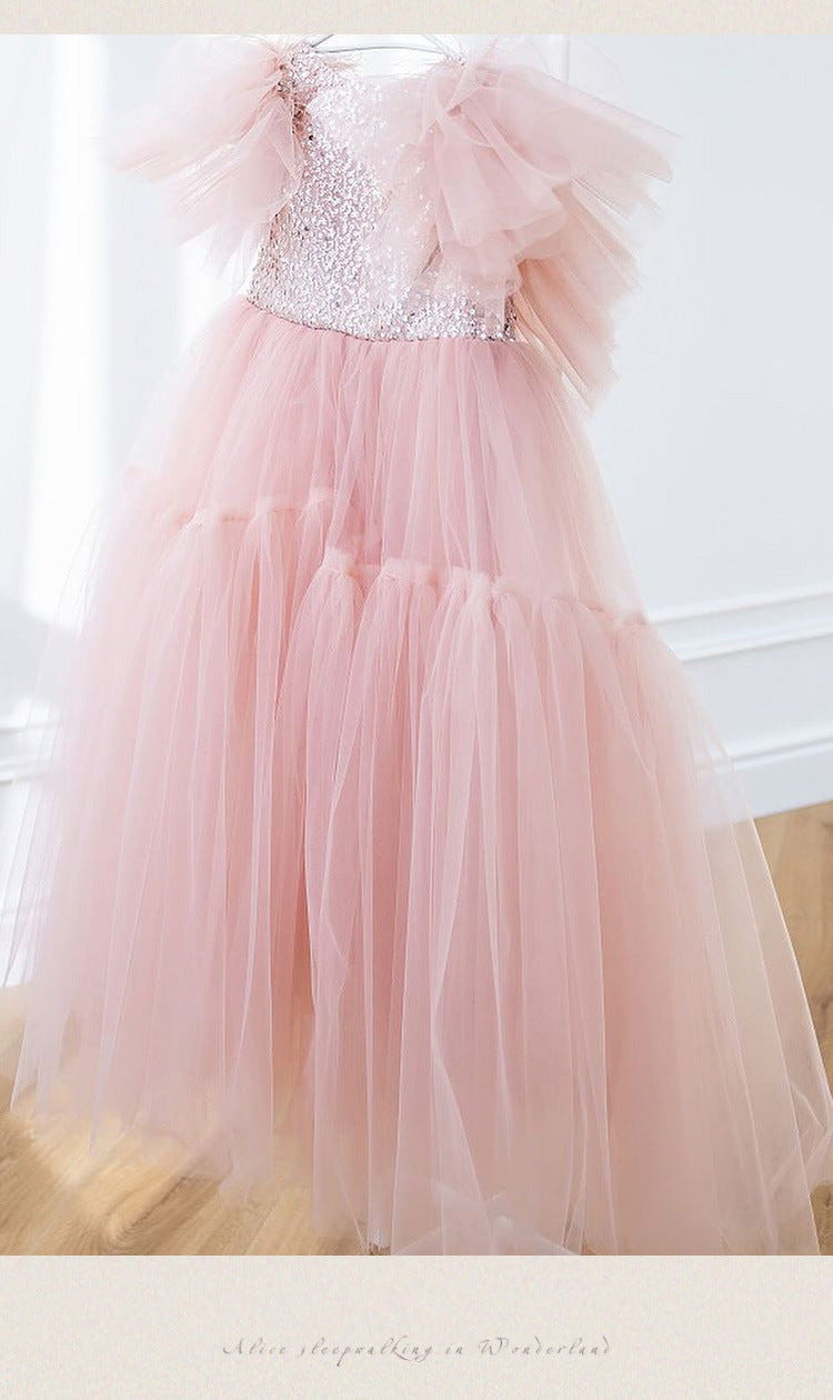 Pink tulle girls princess gown with sequin bodice, ruffled flutter sleeves and tiered train skirt, designed for birthdays and weddings, view 13