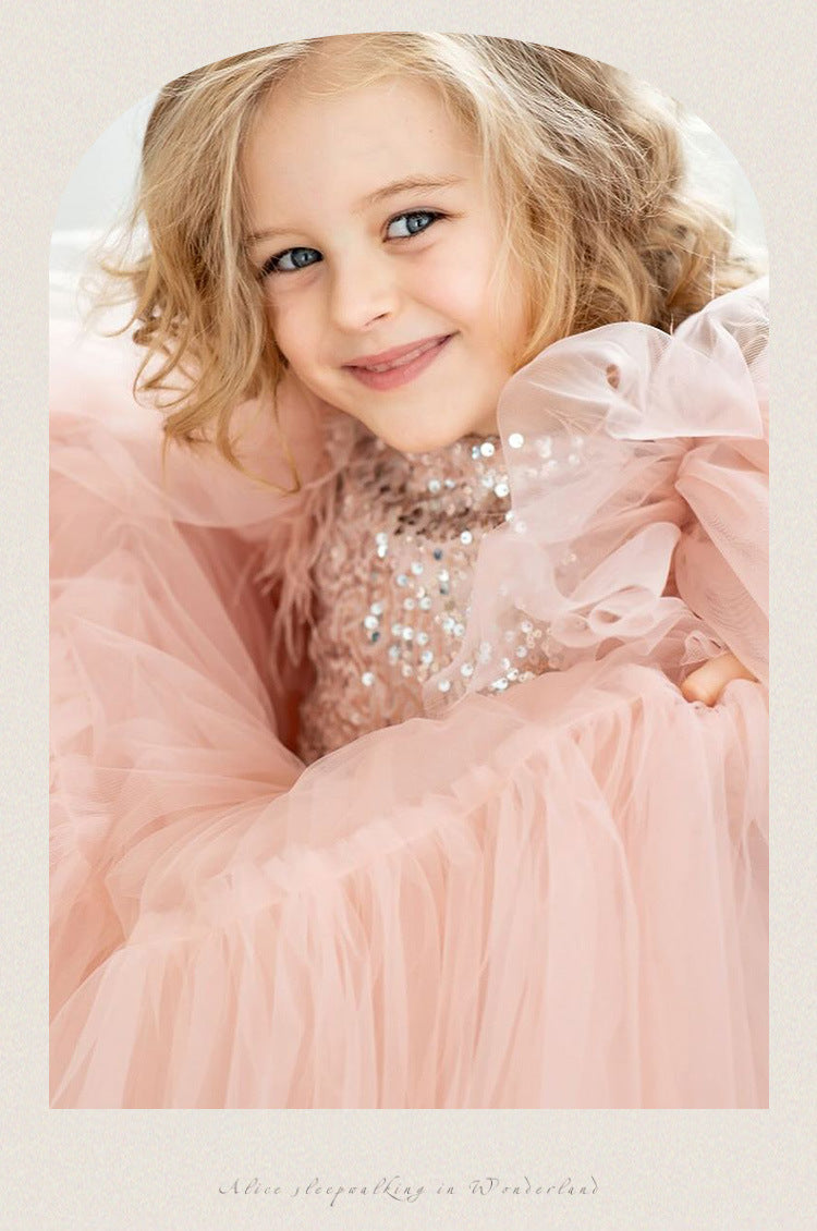 Pink tulle girls princess gown with sequin bodice, ruffled flutter sleeves and tiered train skirt, designed for birthdays and weddings, view 14