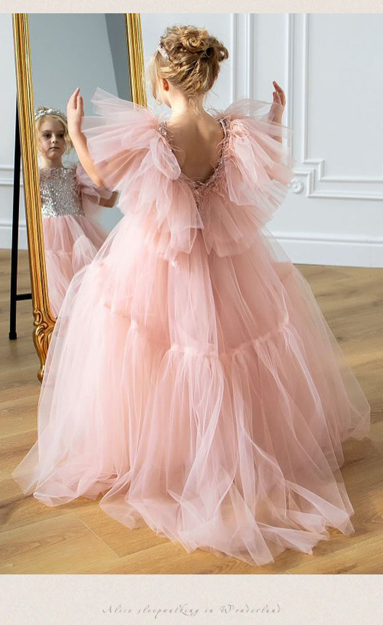 Pink tulle girls princess gown with sequin bodice, ruffled flutter sleeves and tiered train skirt, designed for birthdays and weddings, view 15