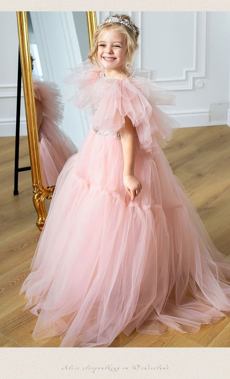Pink tulle girls princess gown with sequin bodice, ruffled flutter sleeves and tiered train skirt, designed for birthdays and weddings, view 16