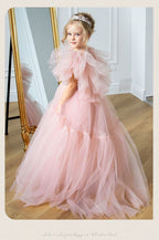 Pink tulle girls princess gown with sequin bodice, ruffled flutter sleeves and tiered train skirt, designed for birthdays and weddings, view 17
