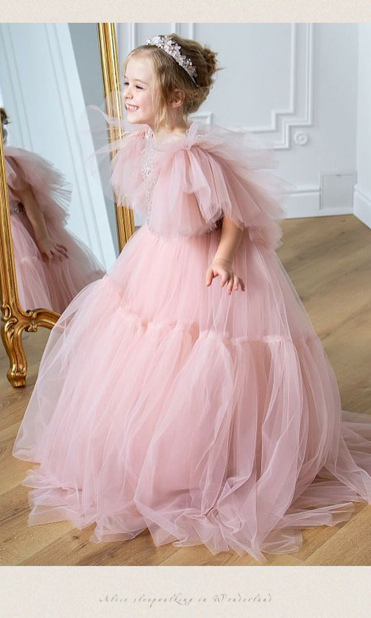 Pink tulle girls princess gown with sequin bodice, ruffled flutter sleeves and tiered train skirt, designed for birthdays and weddings, view 18