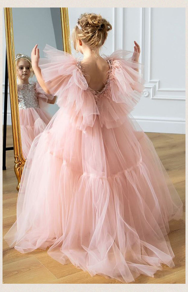 Pink tulle girls princess gown with sequin bodice, ruffled flutter sleeves and tiered train skirt, designed for birthdays and weddings, view 19