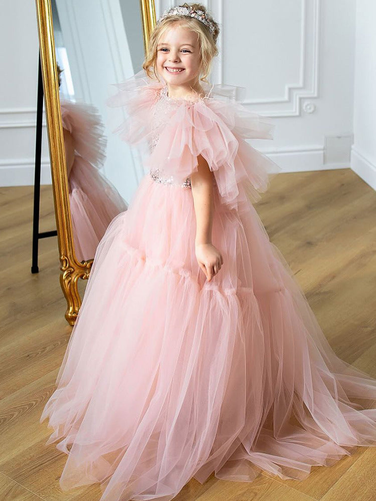 Pink tulle girls princess gown with sequin bodice, ruffled flutter sleeves and tiered train skirt, designed for birthdays and weddings, view 3