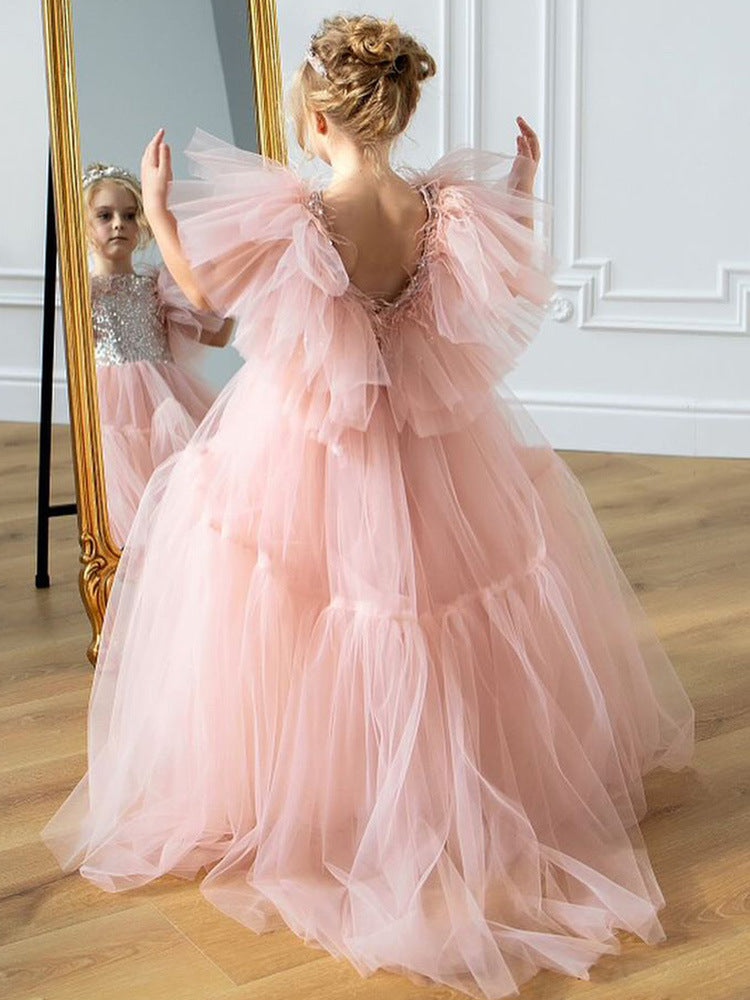 Pink tulle girls princess gown with sequin bodice, ruffled flutter sleeves and tiered train skirt, designed for birthdays and weddings, view 4
