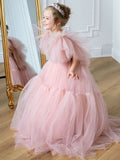 Pink tulle girls princess gown with sequin bodice, ruffled flutter sleeves and tiered train skirt, designed for birthdays and weddings.
