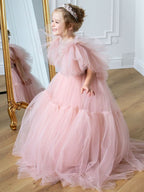 Pink tulle girls princess gown with sequin bodice, ruffled flutter sleeves and tiered train skirt, designed for birthdays and weddings.