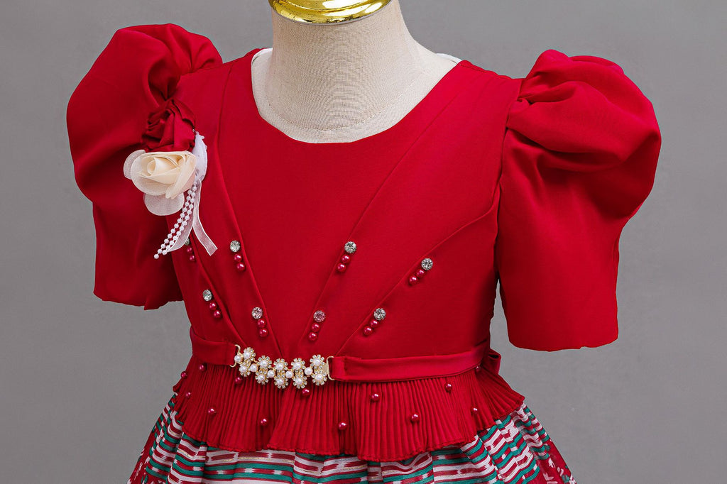 Red girls princess gown bodice with fabric rosette, pearl beads and pearl belt, designed for birthday parties.