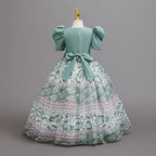 Sage Green printed chiffon girls princess gown back view with sash bow, designed for birthday parties.
